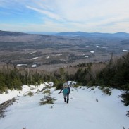 A hiker ascend Maine's Baker Mountain. Image courtesy of Appalachian Mountain Club.