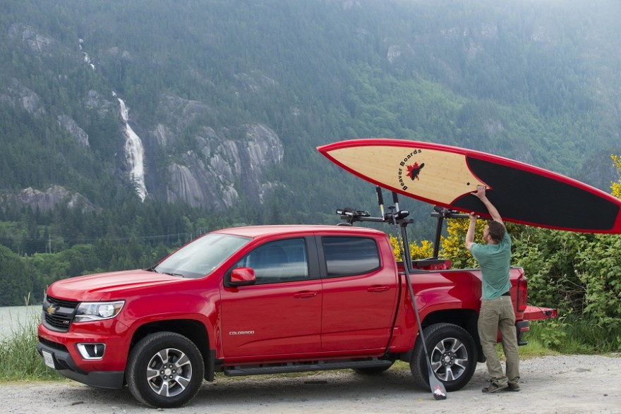 Loading up a Beaver Board, a stand up paddleboard brand made in Squamish.