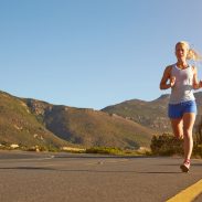 woman road running