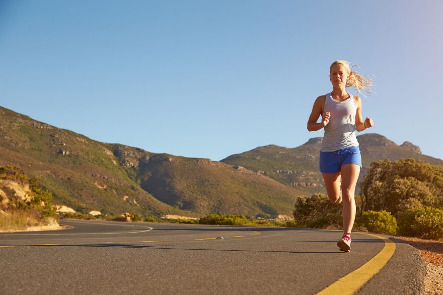 woman road running