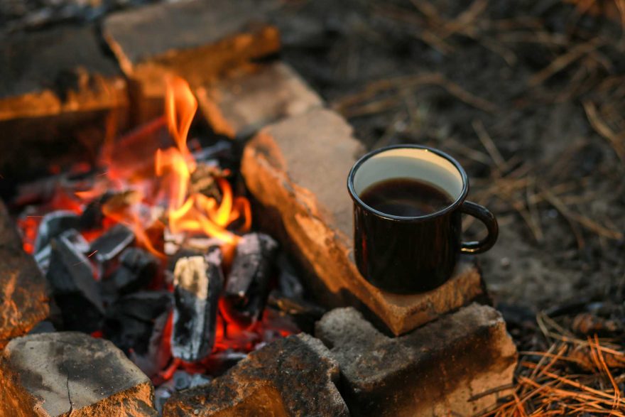 Making camping coffee from a geyser coffee maker on a gas burner,, autumn  outdoor. Male prepares coffee outdoors, travel activity for relaxing,  bushcr Stock Photo - Alamy