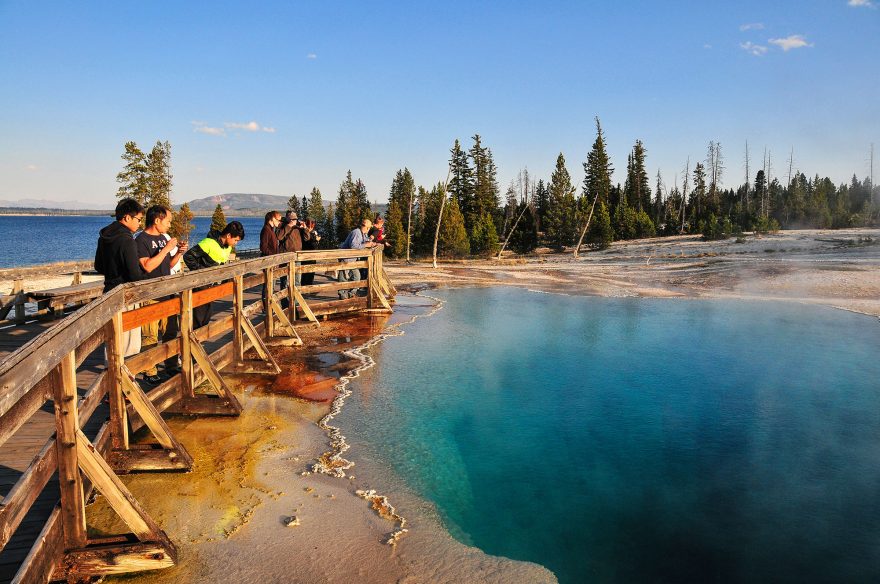 yellowstone-hiker-boardwalk-geyser