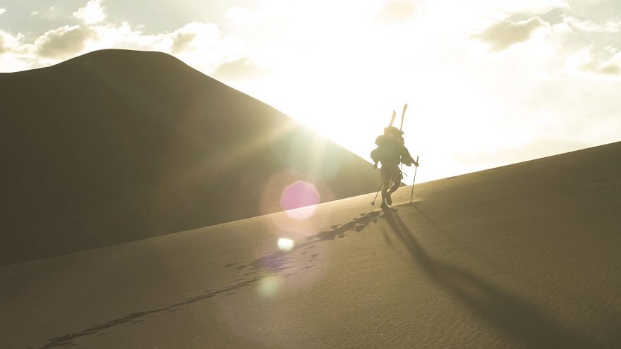 Wade-Holland-hiking-to-the-top-of-Star-Dune