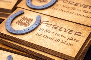 Trophies from the inaugural Forever 10 Mile Trail Race in 2021