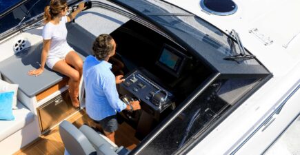 aerial-view-couple-motorboat
